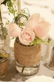 Beautiful, rustic centerpieces are super chic & easy to do yourself! Source: Leonor on Pinterest