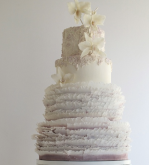 Ruffled cakes are all the rage! Check out this design & more at Maggie Austin Cakes