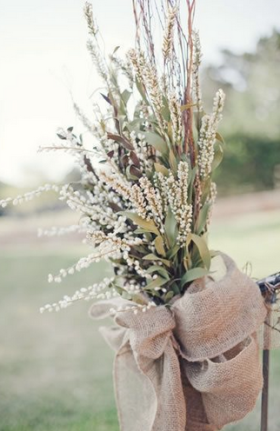 Rustic, chic & a nice blend of neutral shades... this is perfect for the ends of each isle, or centerpieces! Found via Projectwedding.com