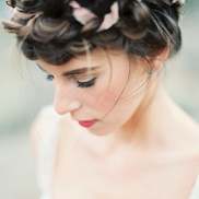 Braids are in & will always make you look young & fresh. Love the incorporation here of fabric! Source: Weddingchicks.com